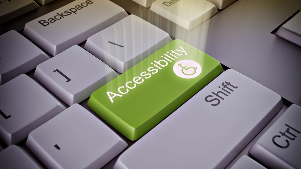 Keyboard with green accessibility key replacing Enter button